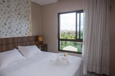 Uma cama ou camas num quarto em Praia do Cumbuco - Apartamento Completo - VG Sun