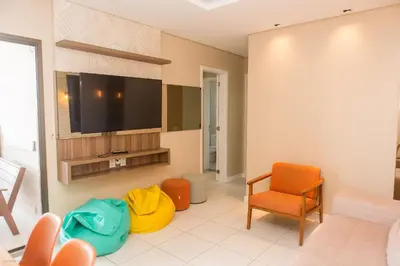Uma área de estar em Praia do Cumbuco - Apartamento Completo - VG Sun
