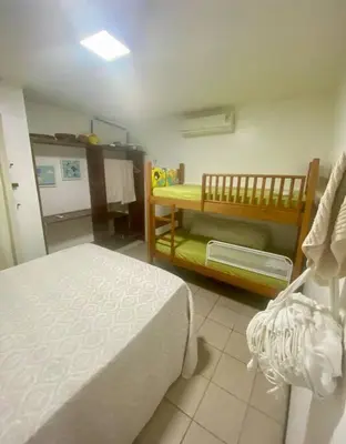 Uma cama ou camas num quarto em Paraíso no Porto das Dunas!