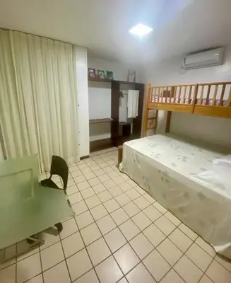 Uma cama ou camas num quarto em Paraíso no Porto das Dunas!