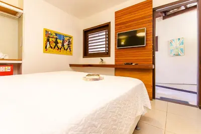 Uma cama ou camas num quarto em Pousada La Vie Jeri