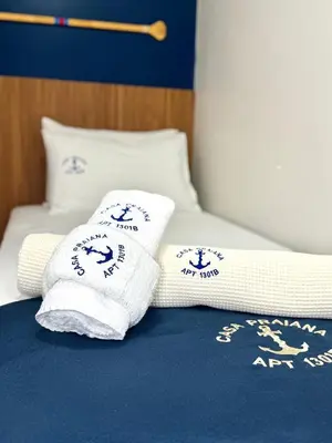 Uma cama ou camas num quarto em Apartamento Casa Praiana - 200m do mar, com vista