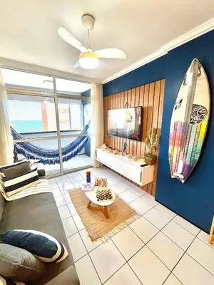 Uma área de estar em Apartamento Casa Praiana - 200m do mar, com vista