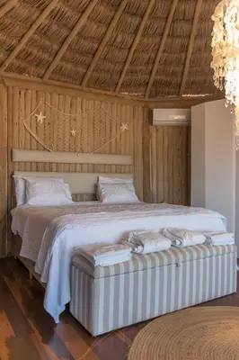 Uma cama ou camas num quarto em Positano Village