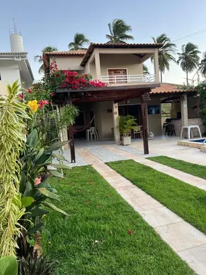 Um jardim no exterior de Casa Atlantico Flecheiras
