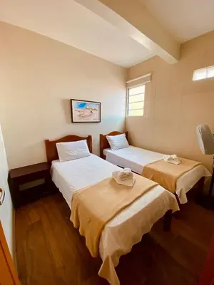 Uma cama ou camas num quarto em Apartamento Charme Guará 2 - Centrinho de Guaramiranga