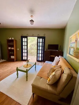 Uma área de estar em Apartamento Charme Guará 2 - Centrinho de Guaramiranga