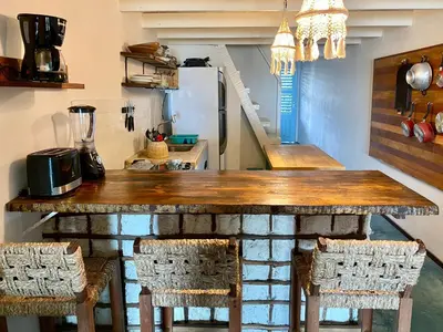A cozinha ou kitchenette de La Moni- Casa frente ao Mar-Sea View