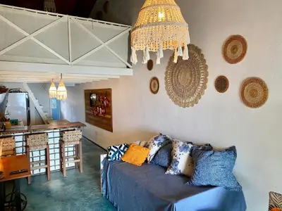 Uma área de estar em La Moni- Casa frente ao Mar-Sea View