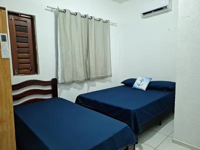 Uma cama ou camas num quarto em Mar Azul Casa de Praia