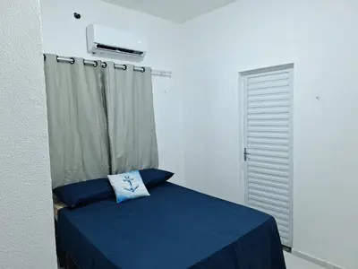 Uma cama ou camas num quarto em Mar Azul Casa de Praia