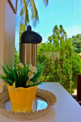 Um jardim no exterior de Pousada Kalunga