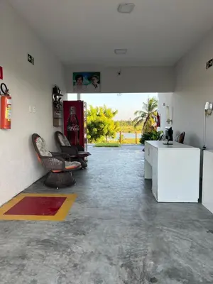 Uma área de estar em Suíte térreo Villa brisa icaraizinho