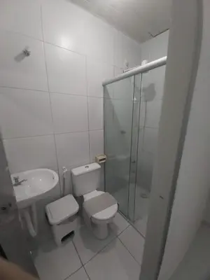 Uma casa de banho em Villa Beira Mar Suítes