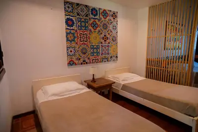 Uma cama ou camas num quarto em Zebra Boutique Hotel
