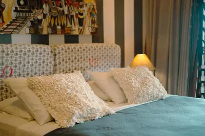 Uma cama ou camas num quarto em Zebra Boutique Hotel