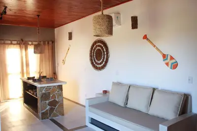 Uma área de estar em Flats Elementus Preá