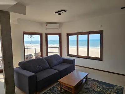 Uma área de estar em 1st Beachfront Deluxe Apartment B102 in Dream Beach Cumbuco