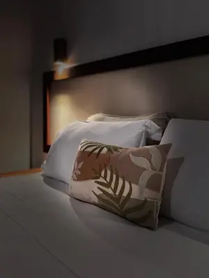 Uma cama ou camas num quarto em Casa Calango suites