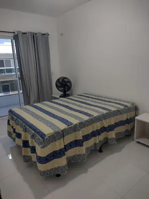 Uma cama ou camas num quarto em Condomínio Azure Residence