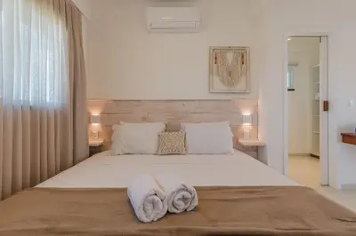 Uma cama ou camas num quarto em Kite Star - Quádruplo com varanda por Carpediem