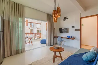 Uma televisão e/ou sistema de entretenimento em Kite Star - Apartamento com varanda por Carpediem