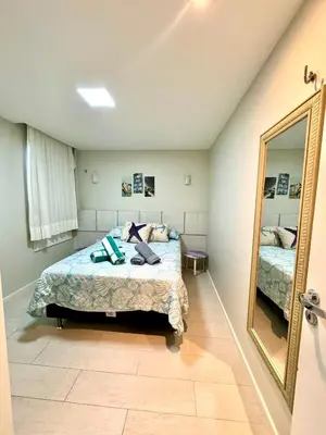 Uma cama ou camas num quarto em Paraíso Beach - Terramaris - Apartamento frente mar, pé na areia, próximo ao Beach Park