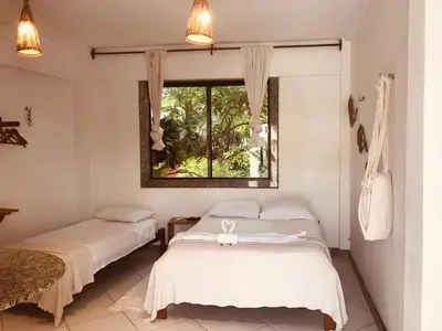 Uma cama ou camas num quarto em Casa Mar Suites