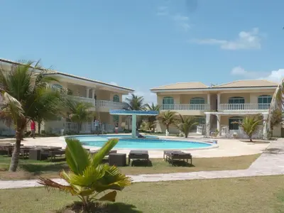 A piscina em ou perto de Apartamento 150m da praia de Canoa Quebrada