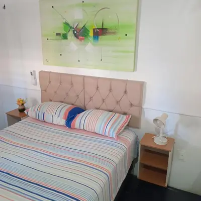 Uma cama ou camas num quarto em Apart-Hotel para 3 pessoas