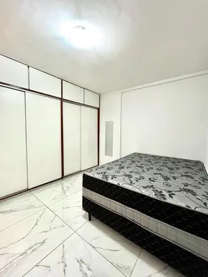 Uma cama ou camas num quarto em Flat Atlântico 405