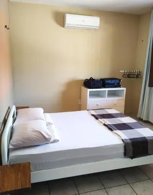 Uma cama ou camas num quarto em Apartamento kite surfe Cumbuco Tabuba