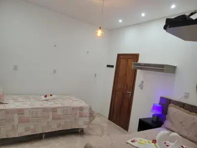 Uma cama ou camas num quarto em Casa Sophis Hospedaria Praia do Preá