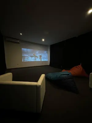 Uma área de estar em PAUSA Hotel