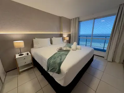 Uma cama ou camas num quarto em Terraços do Atlântico - Beira mar de Iracema