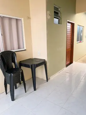 Uma televisão e/ou sistema de entretenimento em Casa de Praia Paracuru