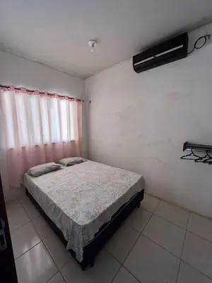 Uma cama ou camas num quarto em Casa de Praia Paracuru