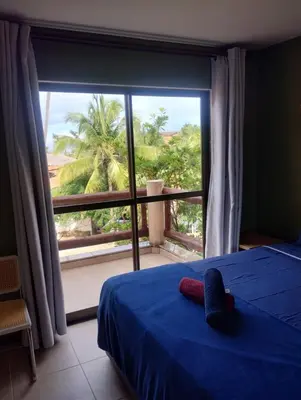 Uma cama ou camas num quarto em Cumbuco Dream Village 503v