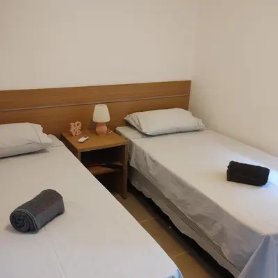 Uma cama ou camas num quarto em Cumbuco Dream Village 503v