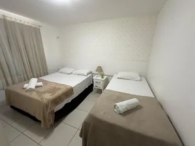 Uma cama ou camas num quarto em TerraMaris - Aptos vista mar, pe na areia, vizinho ao B Park