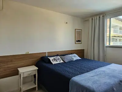 Uma cama ou camas num quarto em Apartamento Porto Beach a 200m do Beach Park