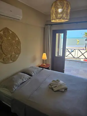 Uma cama ou camas num quarto em Cumbuco Penthouse - Som do Mar - Pé Na Areia - Ocean View - Ar Condicionado, perto do centro, 2 dormitórios, piscina, cozinha