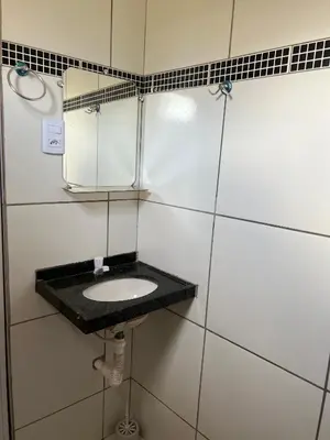 Uma casa de banho em POUSADA Kit net pacoti