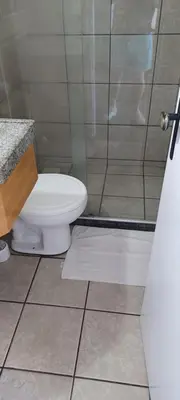 Uma casa de banho em Apartamento Vista Mar