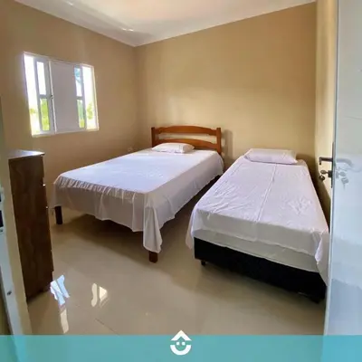Uma cama ou camas num quarto em Vila Rasante, Apartamento 2 quartos completo