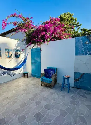 Uma área de estar em Casa Grécia Jericoacoara