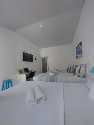 Uma cama ou camas num quarto em Casa Grécia Jericoacoara