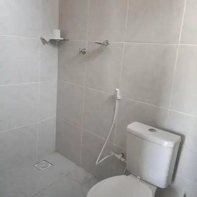 Uma casa de banho em Casa Dférias Icaraizinho - piscina, cascata hidro