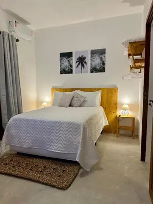 Uma cama ou camas num quarto em Kza da Paty Preá Ben