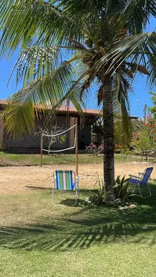 Um jardim no exterior de Vila Ybirá